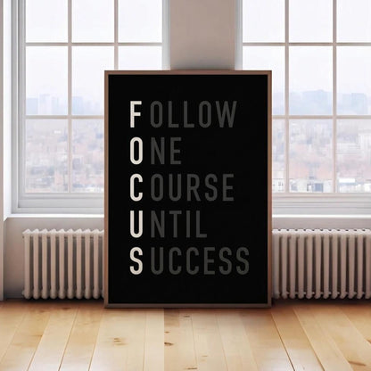 Motivational poster with text 'Follow One Course Until Success' in a room with large windows.