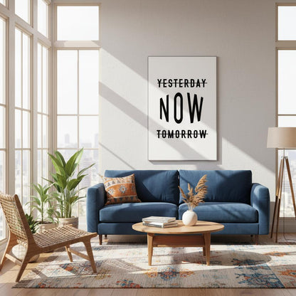 Modern living room with a blue sofa, wooden coffee table, and 'Yesterday Now Tomorrow' artwork.