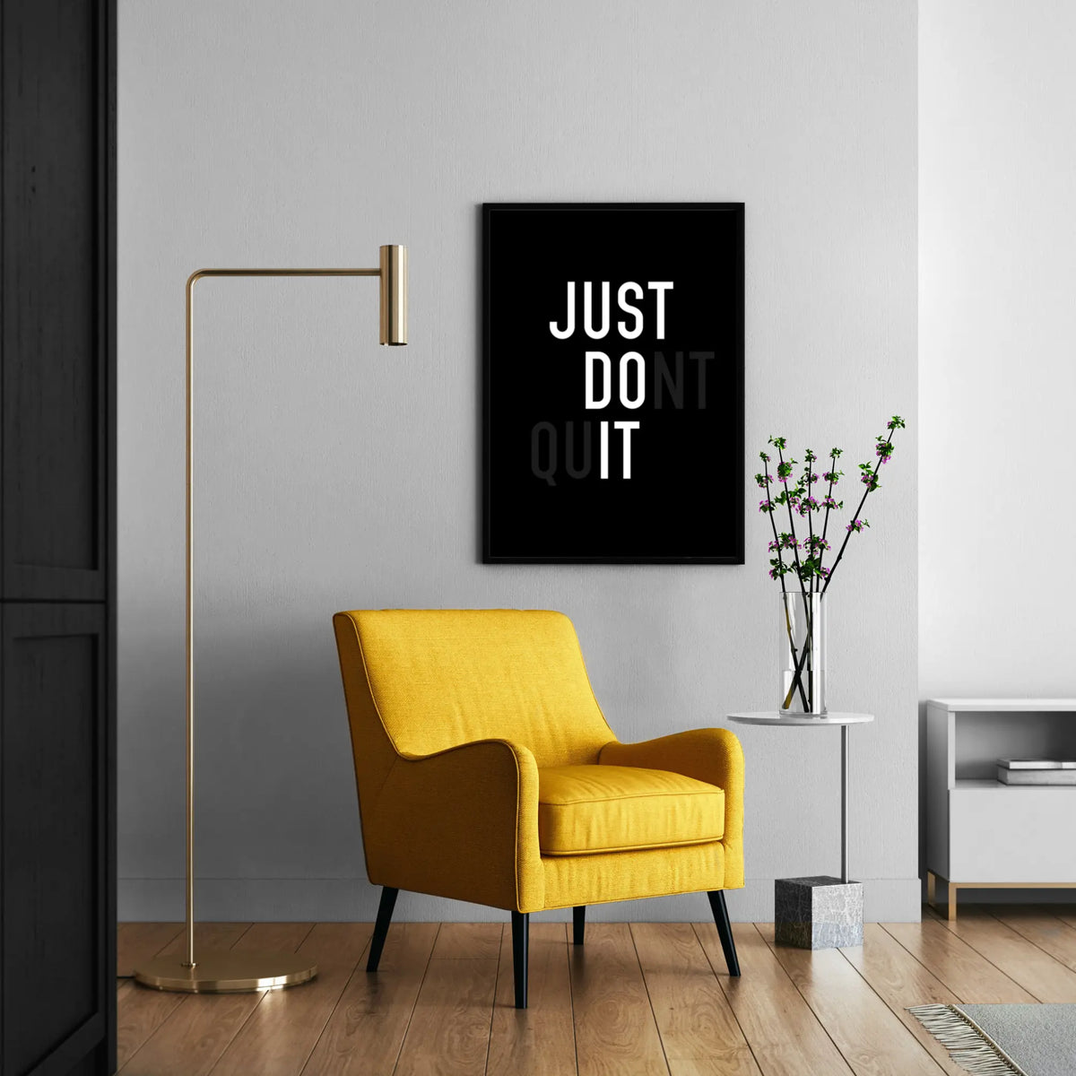 Yellow armchair in a modern living room with just do it don't quit motivational poster on the wall.