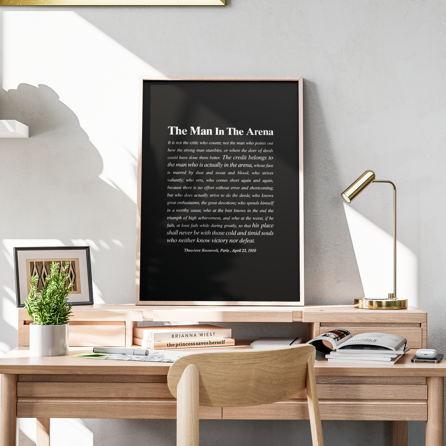 home office office featuring man in the arena motivational wall art